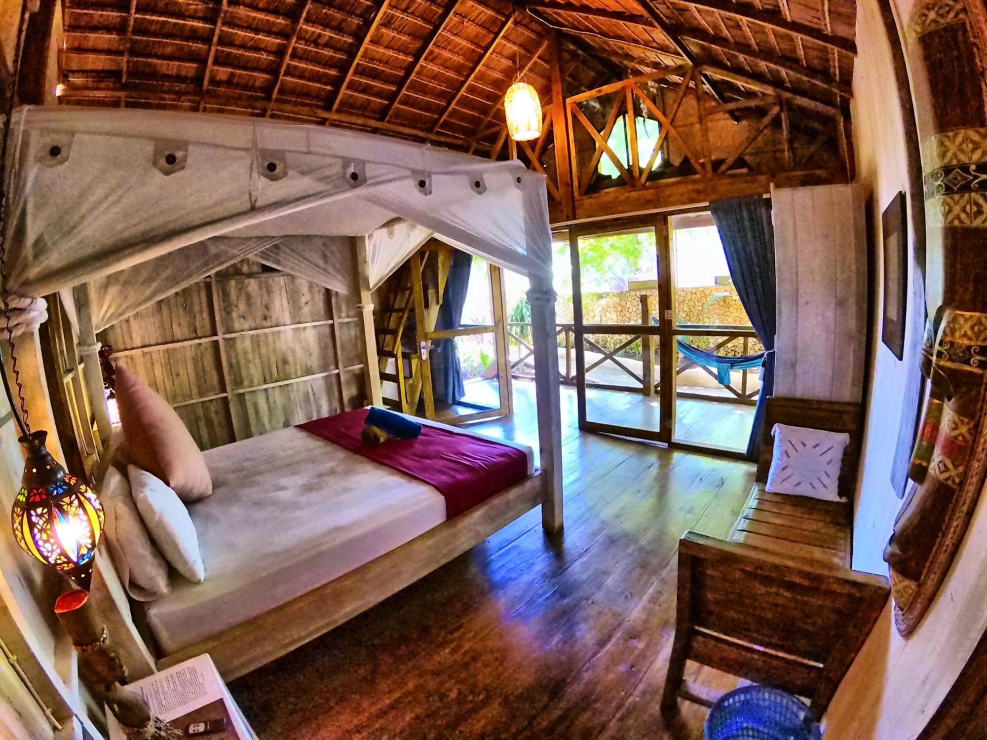 Cosmos Bungalows Bira Esterno foto