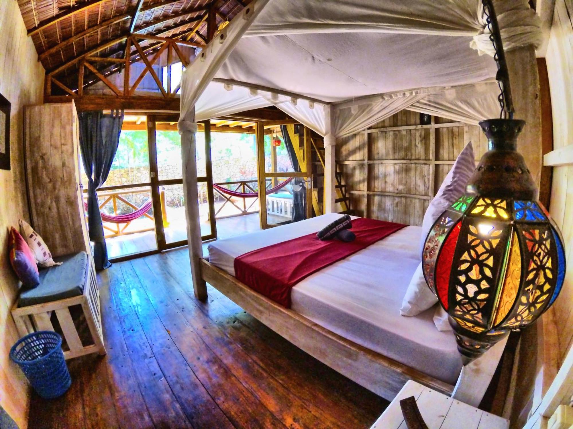 Cosmos Bungalows Bira Esterno foto